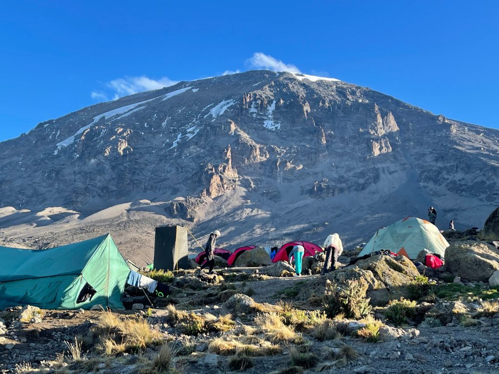 Green mess tent camp below kibo face on Mount Kilimanjaro